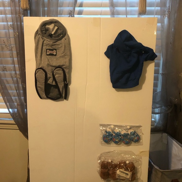 Pet clothes each board is 16.00 Pet size medium.Items are lightly tried on.